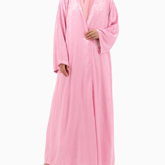 Model wears Pink Floral Abaya