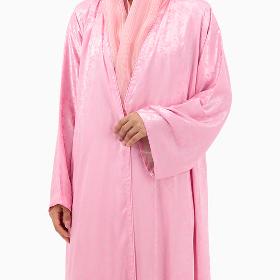 Model wears Pink Floral Abaya