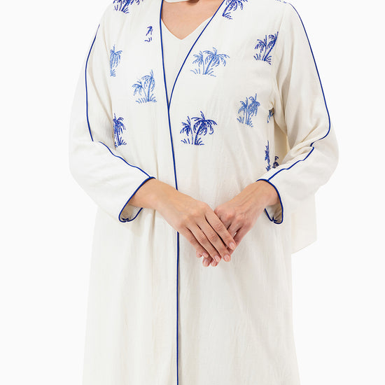 Model wears White Palm Abaya