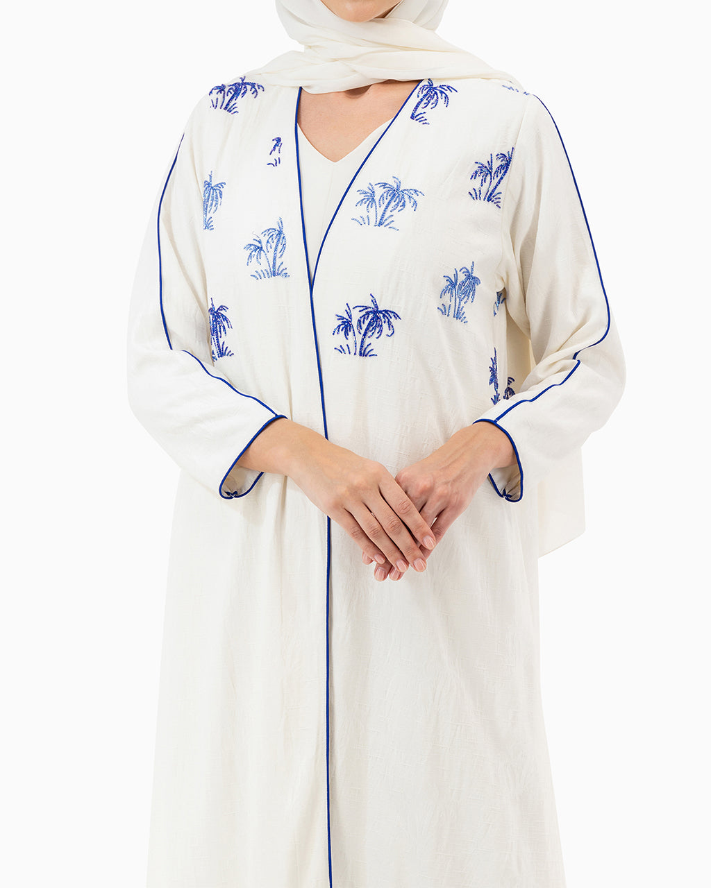 Model wears White Palm Abaya