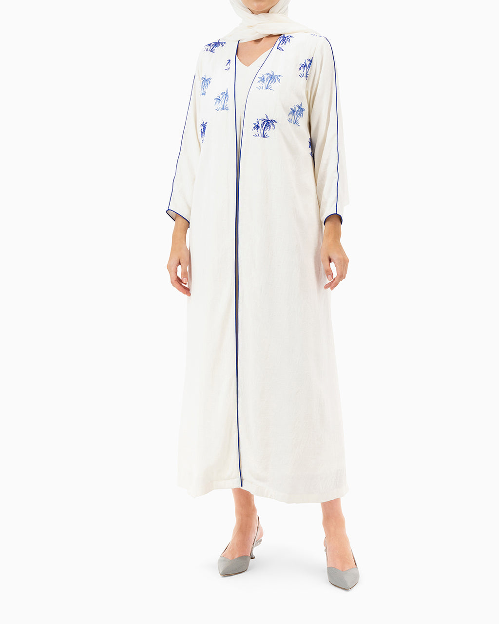 Model wears White Palm Abaya