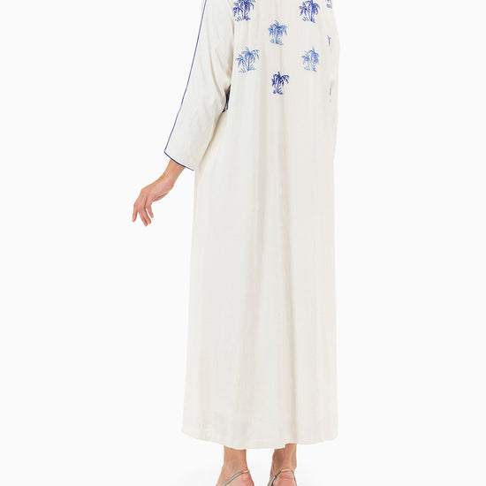 Model wears White Palm Abaya