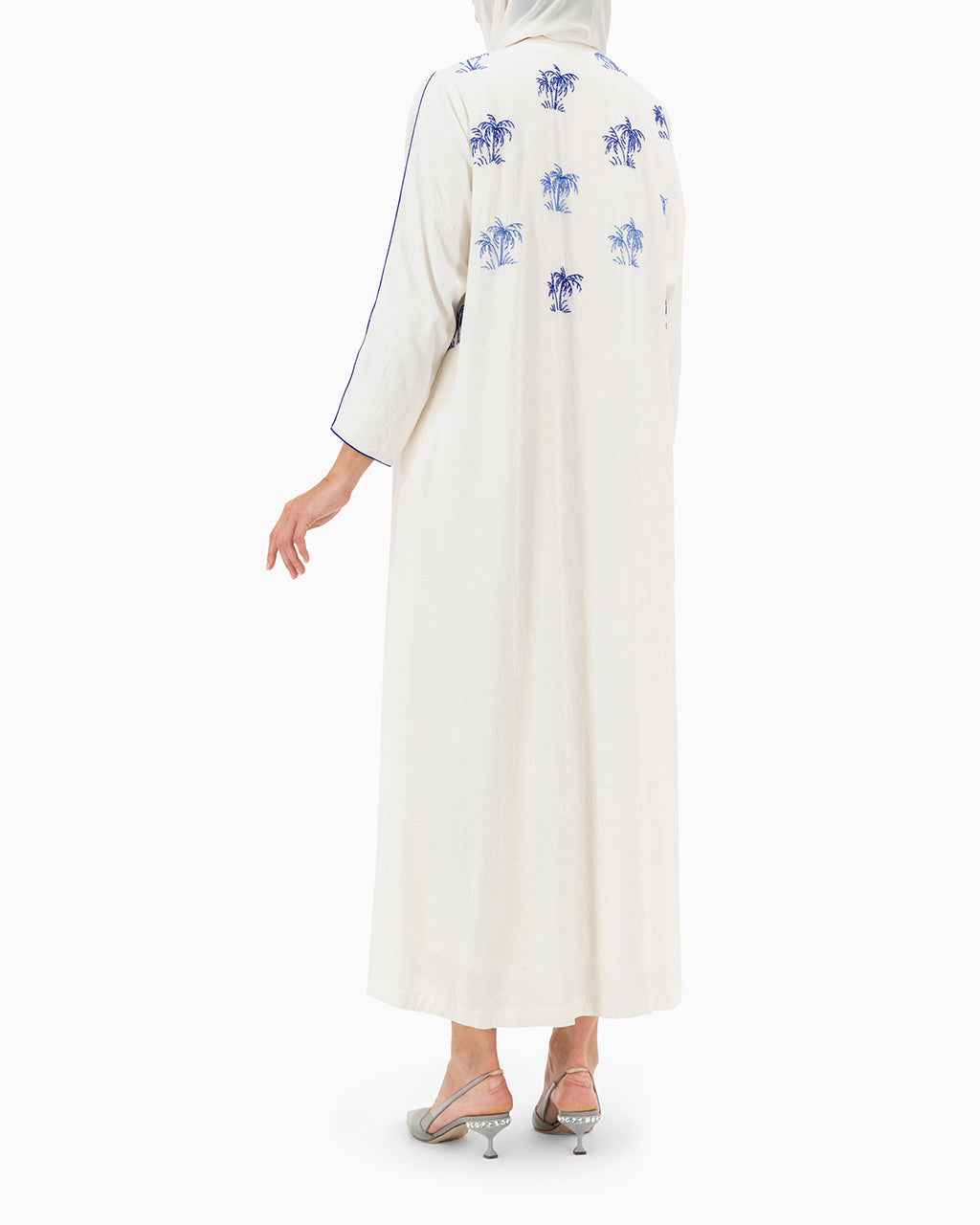 Model wears White Palm Abaya