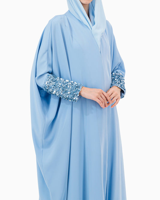 Model wears Sky Blue Abaya