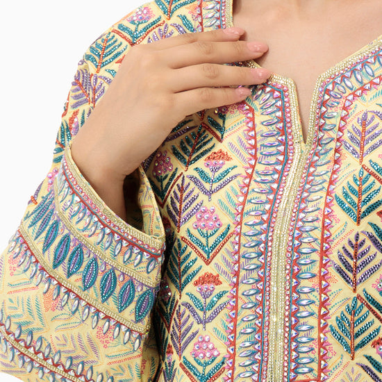 Model wears Amna Yellow