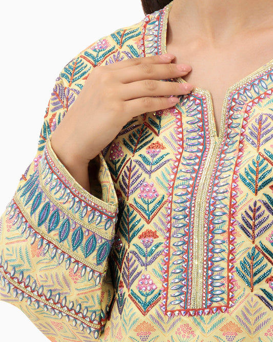 Model wears Amna Yellow