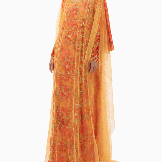 Model wears Mkhawar | Orange with Thoub