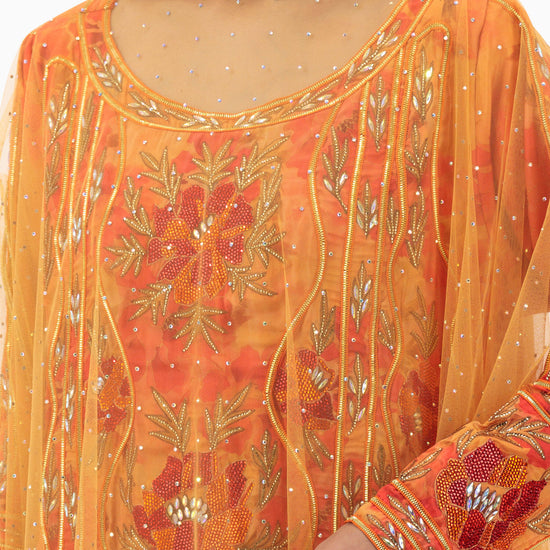 Model wears Mkhawar | Orange with Thoub
