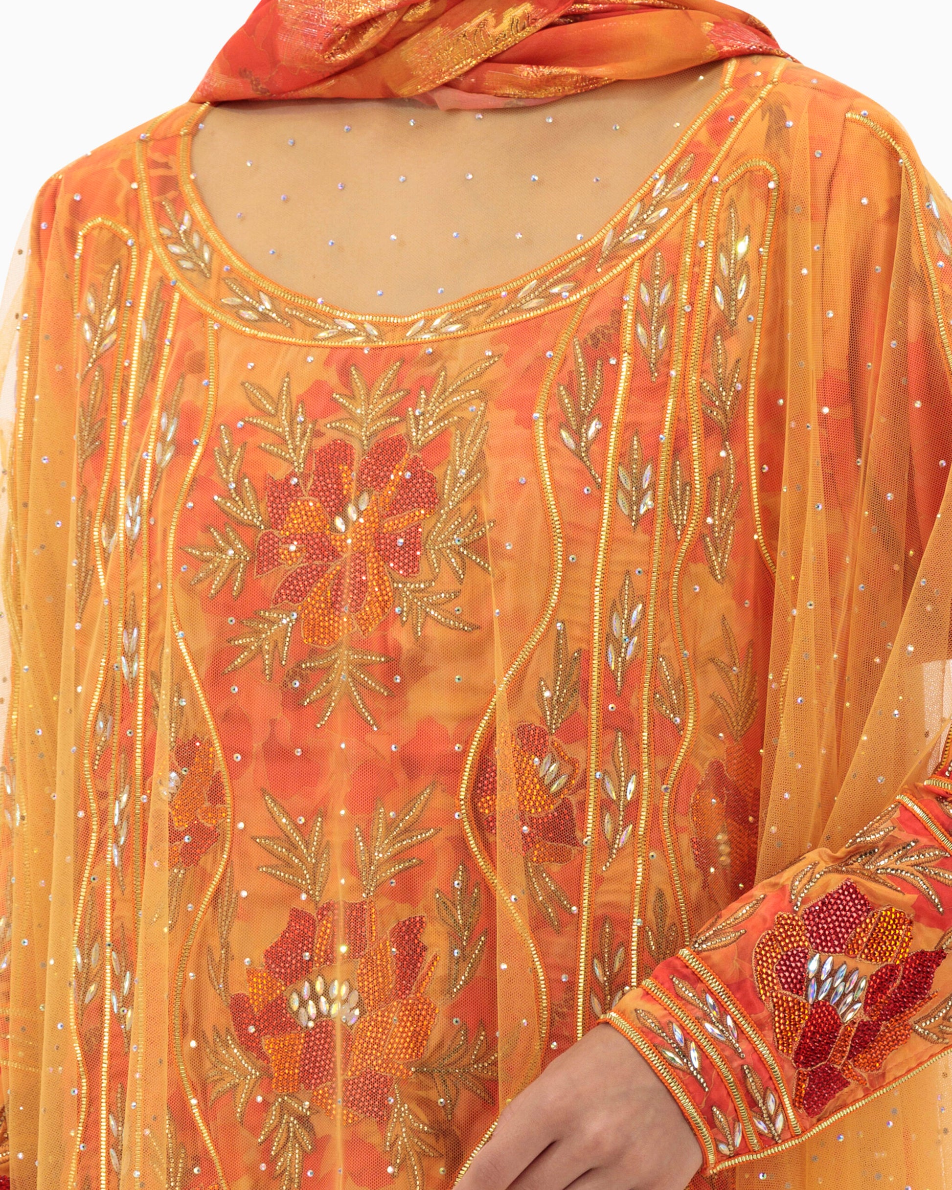 Model wears Mkhawar | Orange with Thoub
