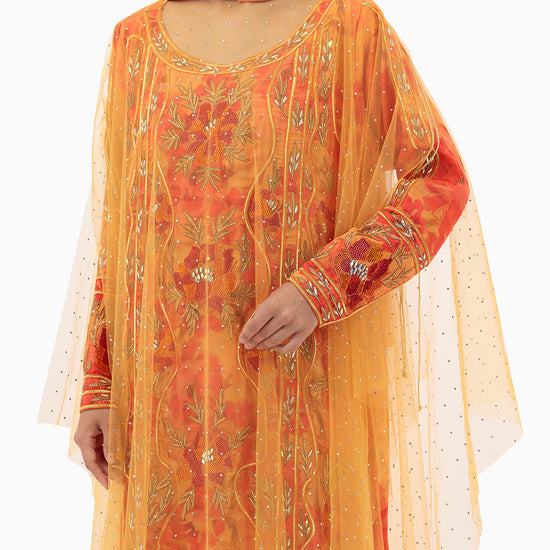 Model wears Mkhawar | Orange with Thoub