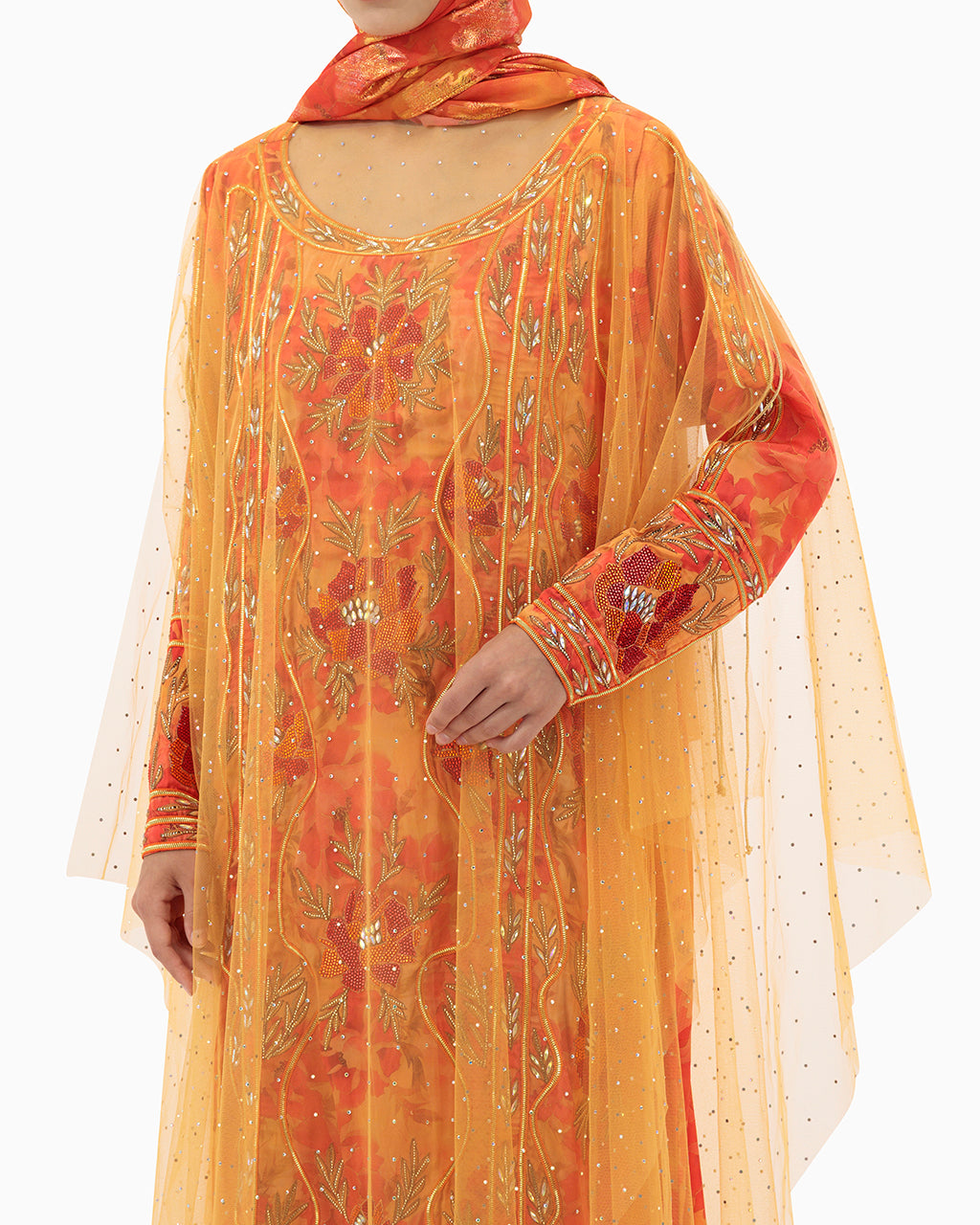Model wears Mkhawar | Orange with Thoub