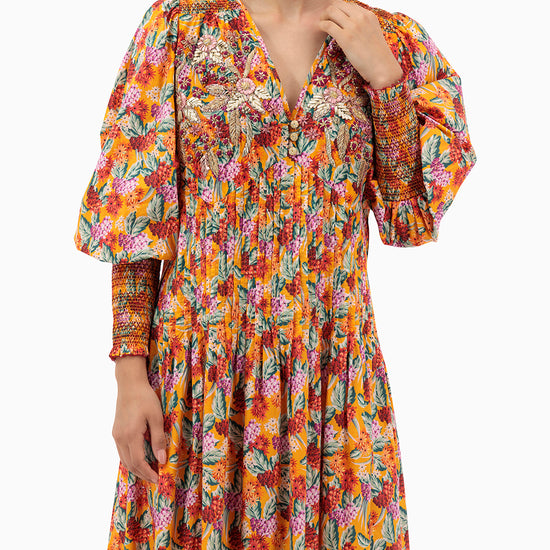 Model wears Orange Pleated Kaftan