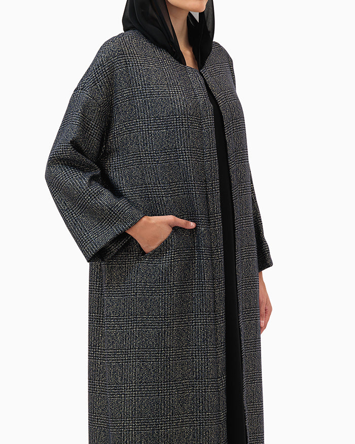 Model wears Black Chequered Abaya