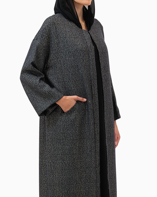 Model wears Black Chequered Abaya