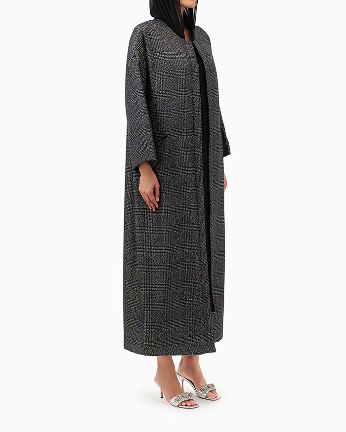 Model wears Black Chequered Abaya