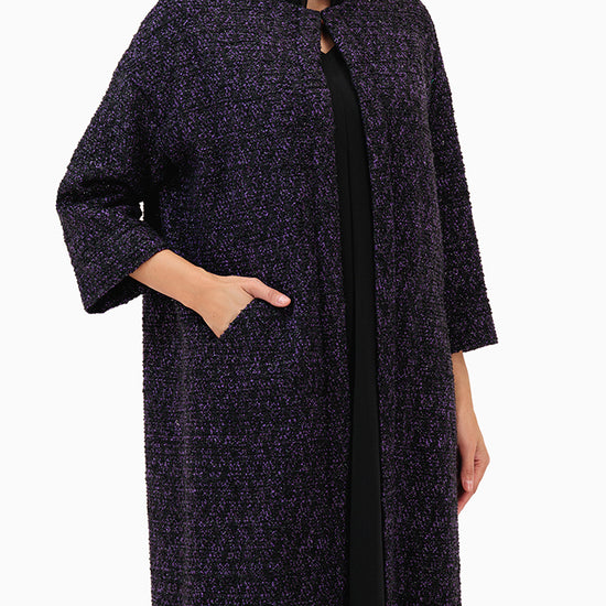 Model wears Purple Abaya