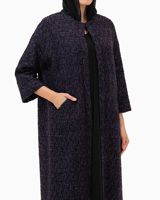 Model wears Purple Abaya