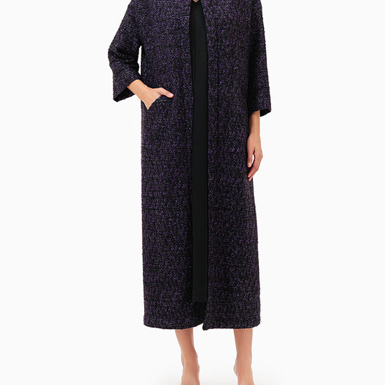 Model wears Purple Abaya