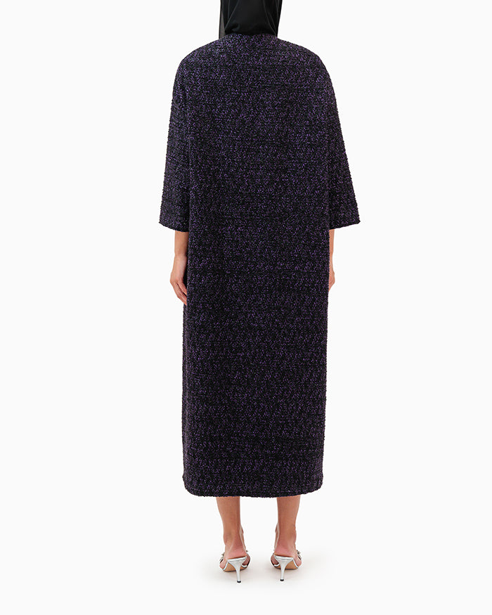 Model wears Purple Abaya
