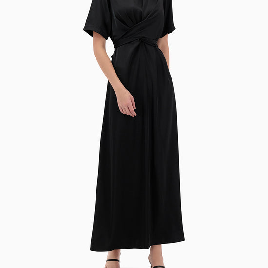 Model wears Karmin Dress