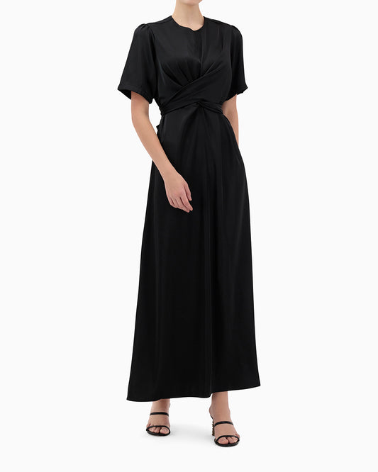 Model wears Karmin Dress