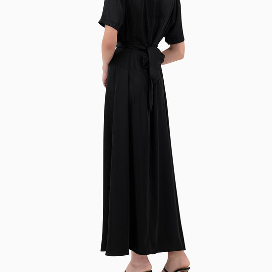 Model wears Karmin Dress