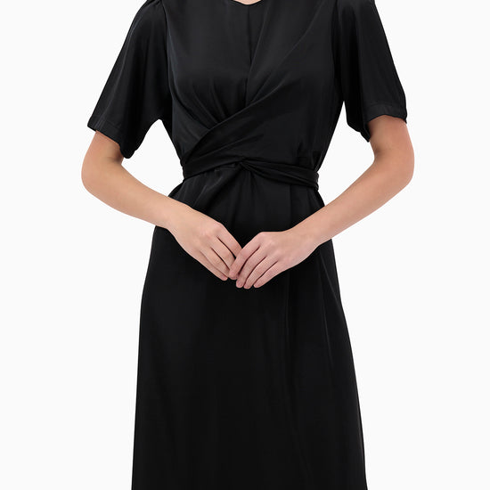 Model wears Karmin Dress