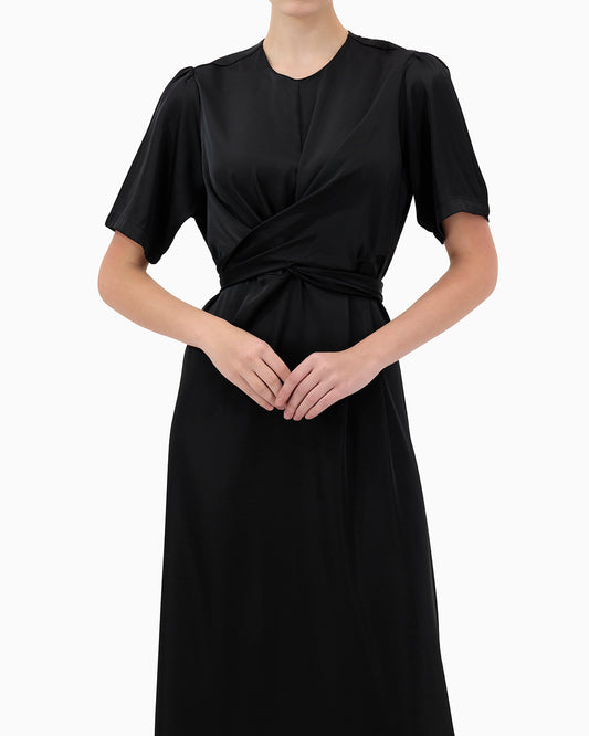 Model wears Karmin Dress