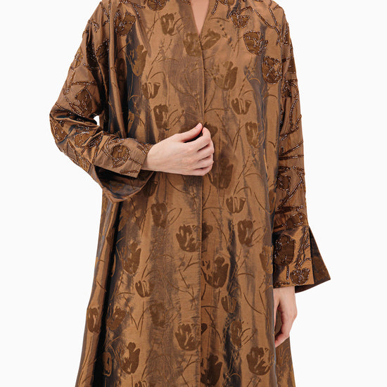 Model wears Brown Floral Abaya