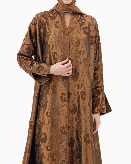 Model wears Brown Floral Abaya