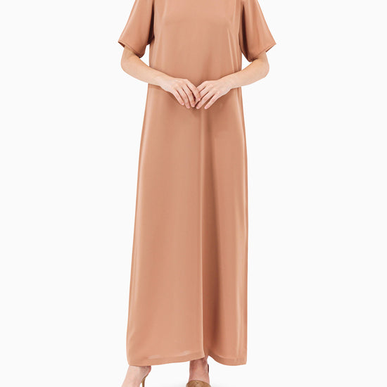 Model wears Brown Floral Abaya