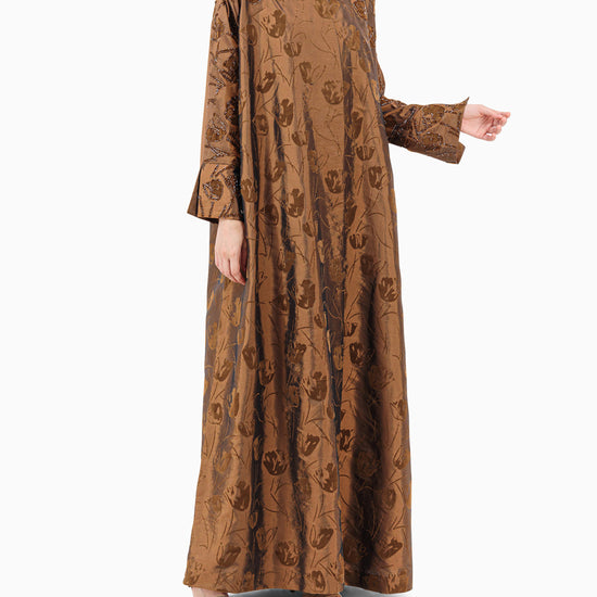 Model wears Brown Floral Abaya