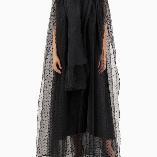 Model wears Black Dots Wedding Abaya