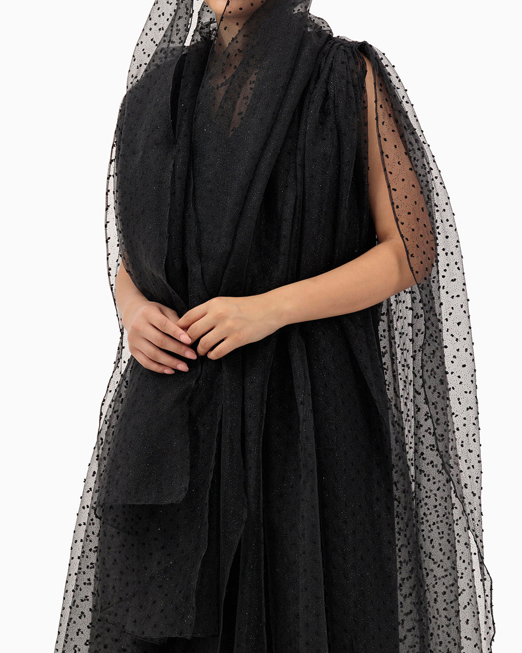 Model wears Black Dots Wedding Abaya