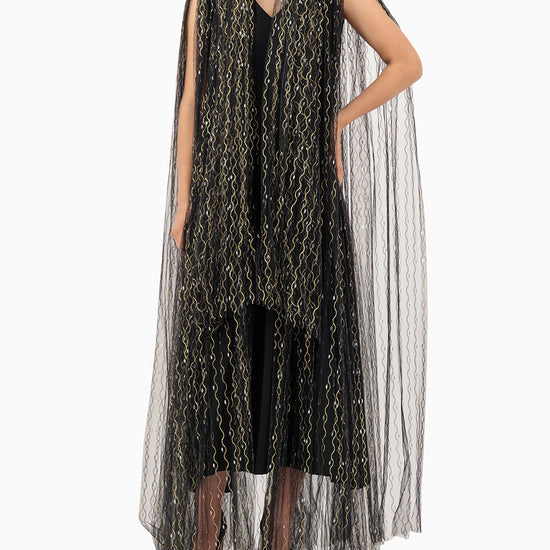 Model wears Gold Swirl Wedding Abaya