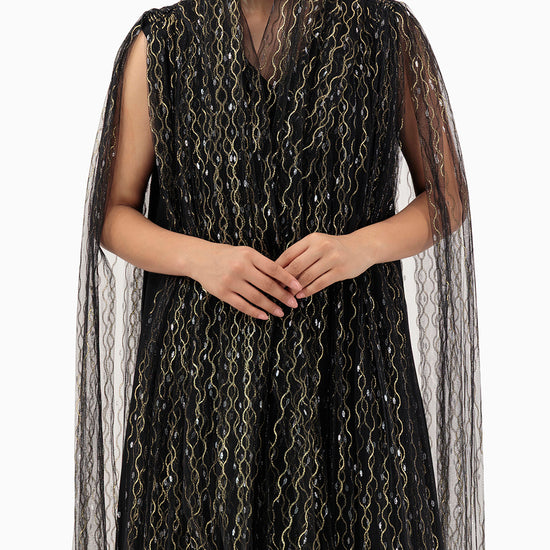 Model wears Gold Swirl Wedding Abaya