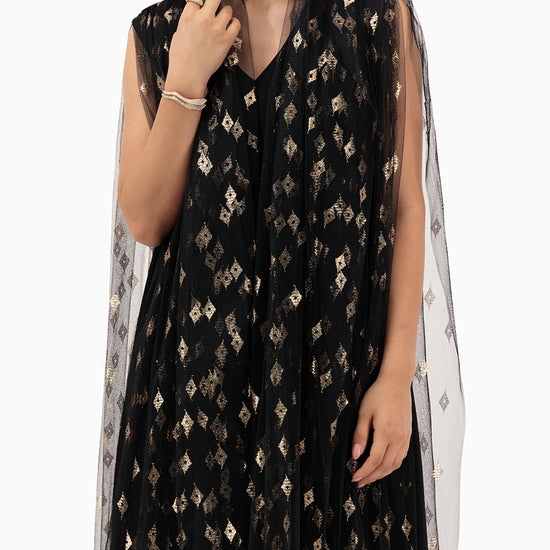 Model wears Gold Patterned Wedding Abaya