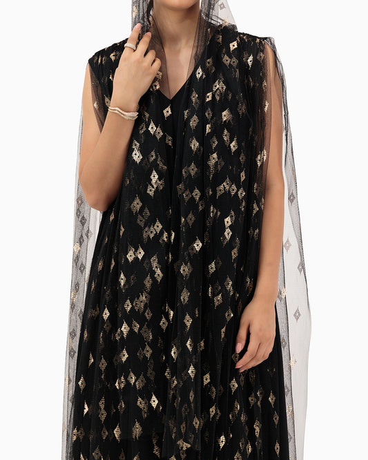 Model wears Gold Patterned Wedding Abaya