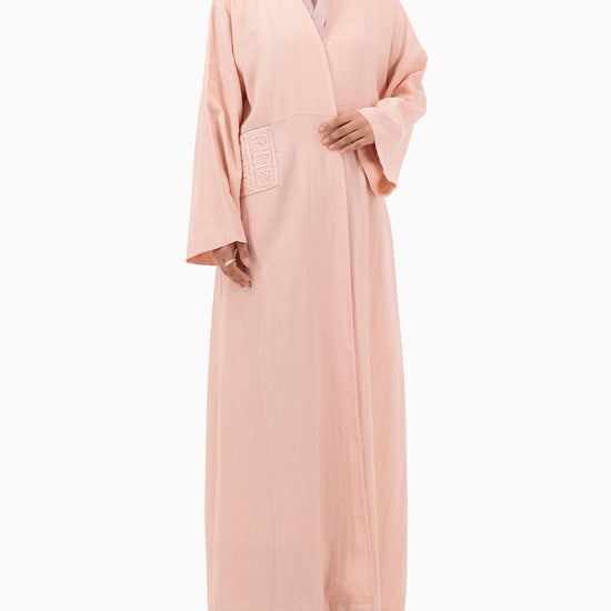 Model wears Peach Linen Abaya