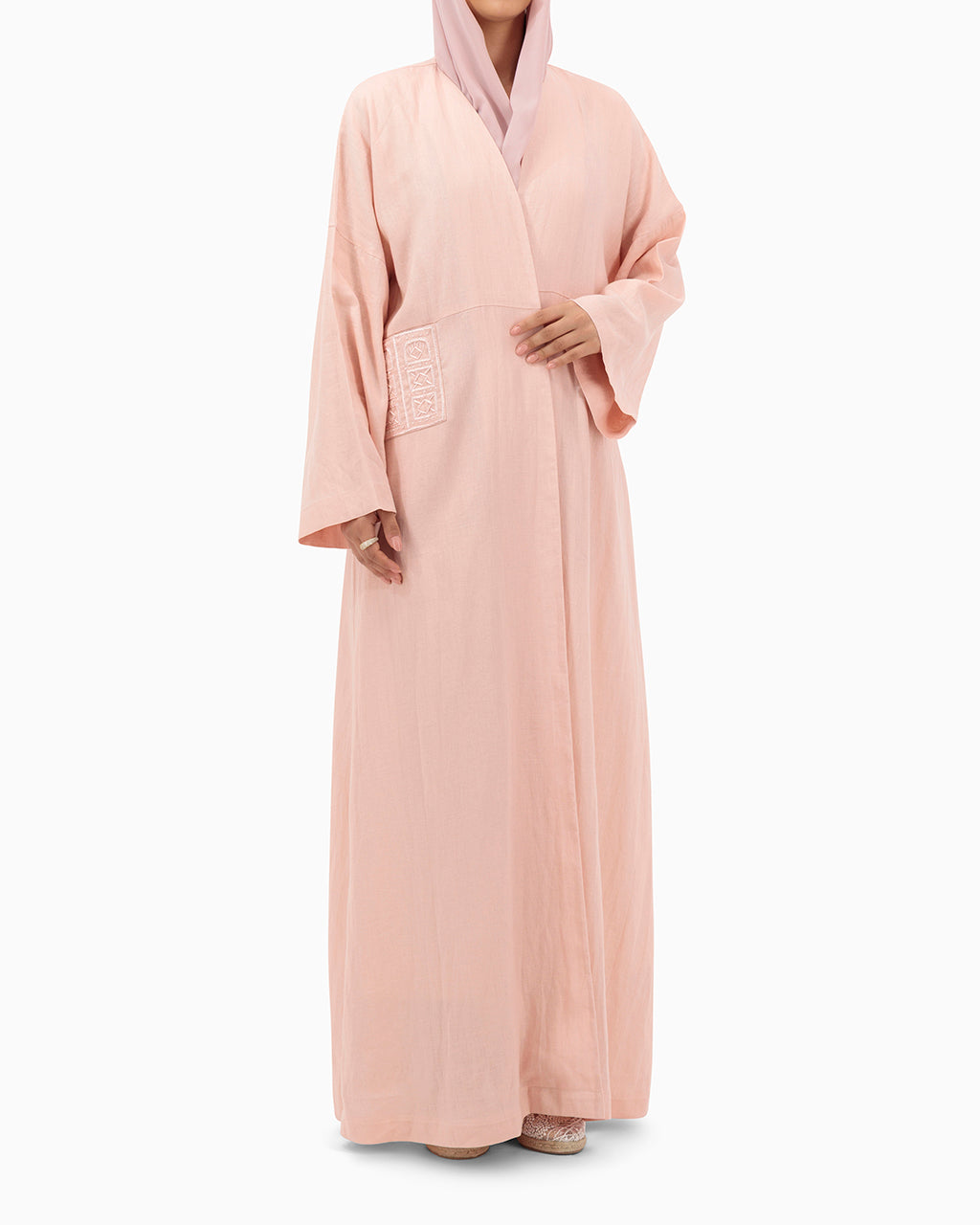 Model wears Peach Linen Abaya
