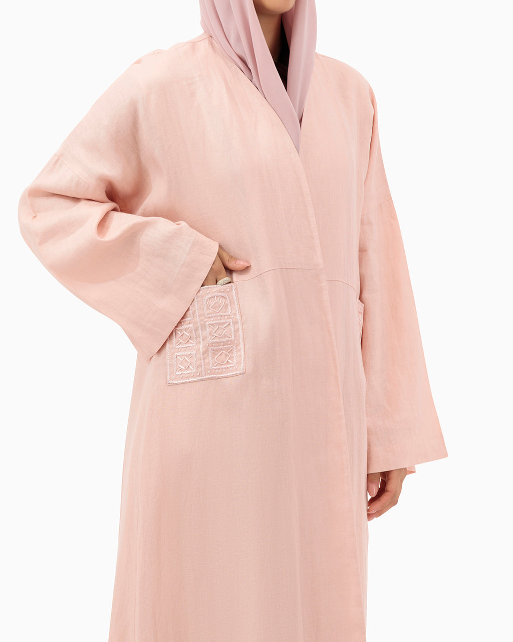 Model wears Peach Linen Abaya