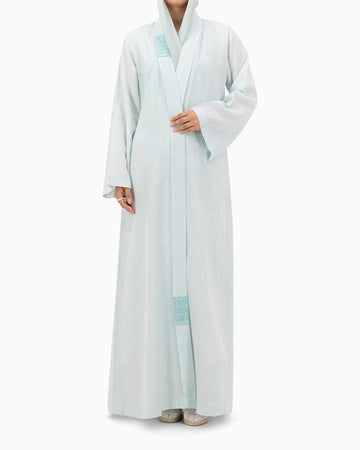 Model wears Pastel Blue Linen Abaya