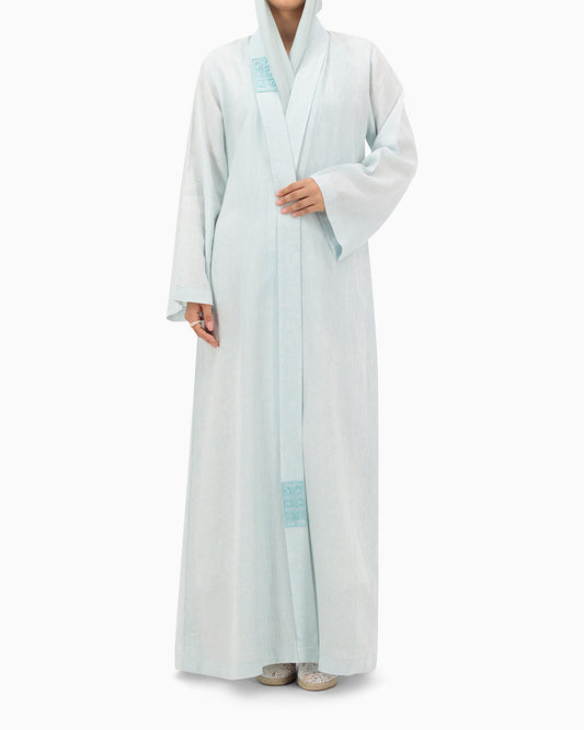 Model wears Pastel Blue Linen Abaya