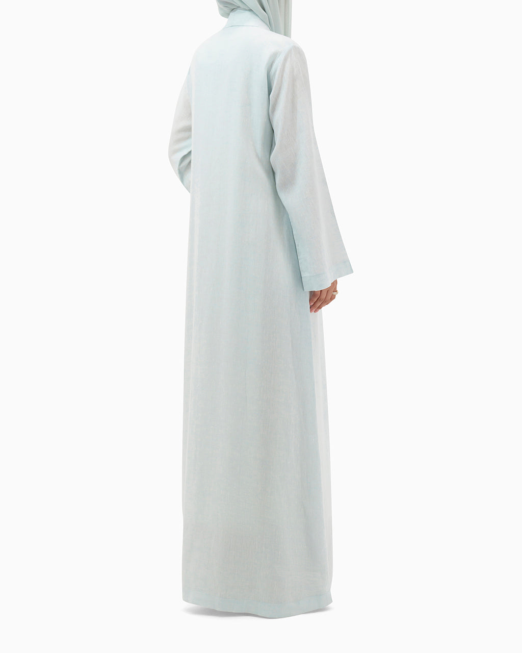 Model wears Pastel Blue Linen Abaya
