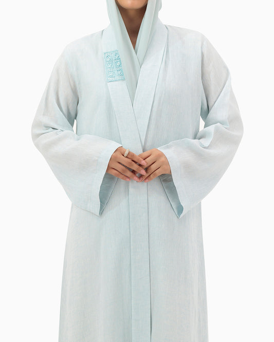 Model wears Pastel Blue Linen Abaya