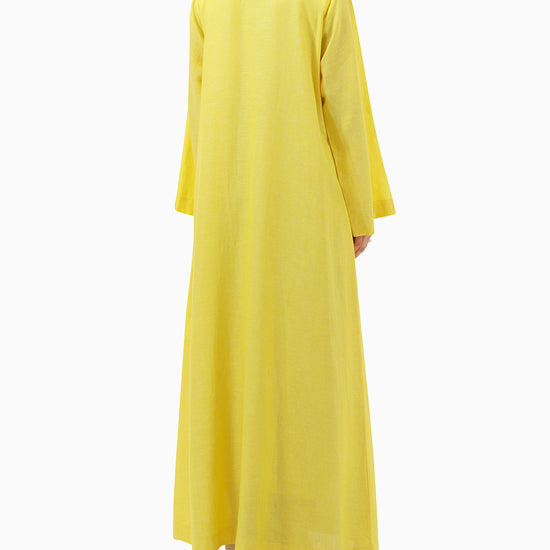 Model wears Yellow Linen Abaya