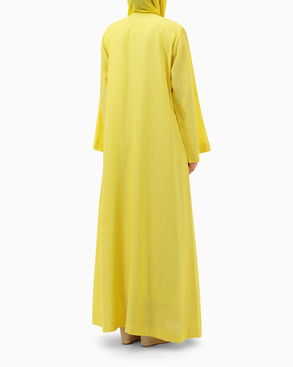 Model wears Yellow Linen Abaya