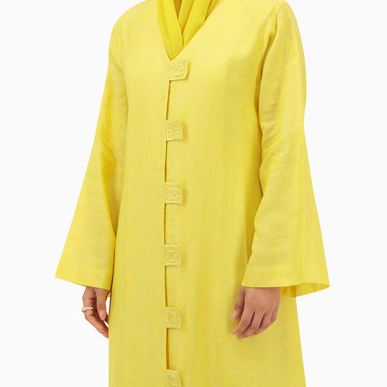 Model wears Yellow Linen Abaya