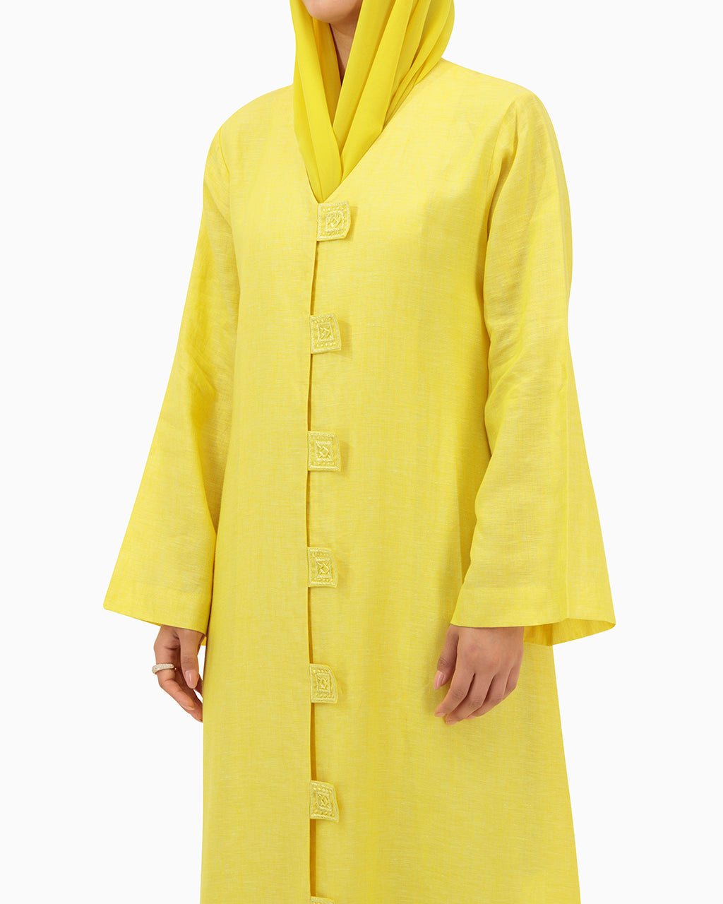 Model wears Yellow Linen Abaya