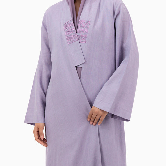 Model wears Purple Linen Abaya